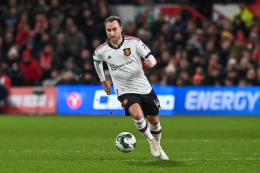 Christian Eriksen #14 of Manchester United makes a break with the ball during the Carabao Cup Semi-Finals match Nottingham Forest vs Manchester United at City Ground, Nottingham, United Kingdom, 25th January 202