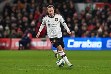 Christian Eriksen #14 of Manchester United makes a break with the ball during the Carabao Cup Semi-Finals match Nottingham Forest vs Manchester United at City Ground, Nottingham, United Kingdom, 25th January 202