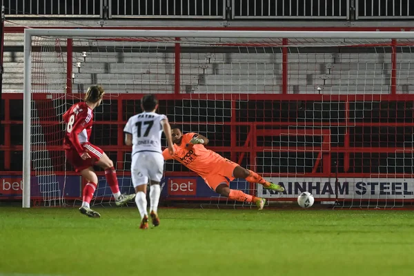 Tommy Leigh #8 of Accrington Stanley scores to make it 1-0 during the Emirates FA Cup Third Round Replay match Accrington Stanley vs Boreham Wood at Wham Stadium, Accrington, United Kingdom, 24th January 202