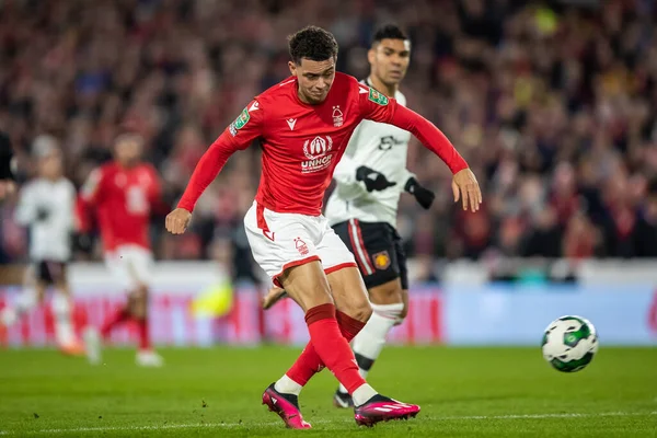 Brennan Johnson #20 of Nottingham Forest has a shot at goal during the Carabao Cup Semi-Finals match Nottingham Forest vs Manchester United at City Ground, Nottingham, United Kingdom, 25th January 202