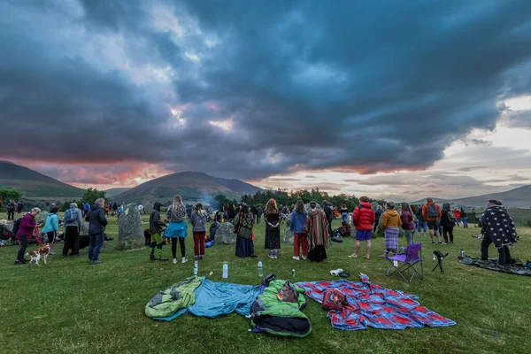 stock image People gather to watch the sun rise during the Castlerigg Stone Circle Summer Solstice Celebration, United Kingdom, 20th June 2023