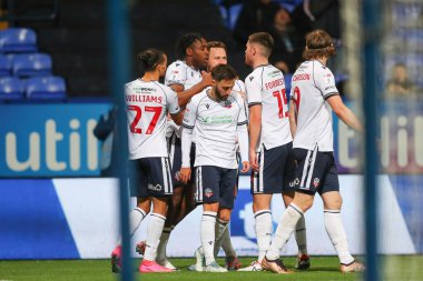 Bolton Wanderers 'ın 11 numaralı oyuncusu Dan Nlundulu, 26 Eylül 2023' te İngiltere 'nin Toughsheet Community Stadyumu' nda oynanan EFL Kupa Maçı 'nda Bolton Wanderers' ın Manchester United U21 'e karşı 4-0' lık galibiyetini kutluyor.