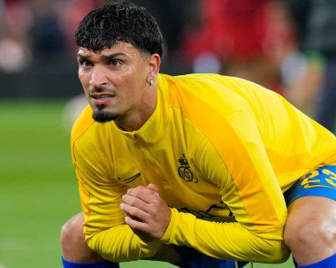 Union Saint-Gilloise takımının 23 numaralı Cameron Puertas, 5 Ekim 202 'de İngiltere' nin Liverpool kentinde oynanan Liverpool-Union Saint-Gilloise maçından önce ısınmaya başladı.