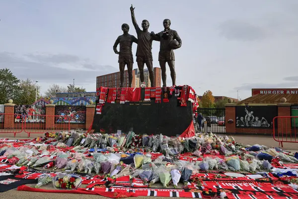 stock image Fans pay tribute to the late Sir Bobby Charlton outside of Old Trafford, Manchester, United Kingdom, 23rd October 2023