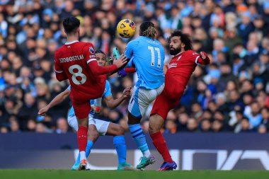 Manchester City 'den Jeremy Doku # 11 ve Liverpool' dan Mohamed Salah # 11 Premier Lig karşılaşmasında Manchester City - Liverpool Etihad Stadyumu, Manchester, İngiltere, 25 Kasım 2023