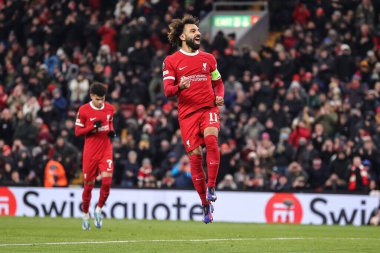 Liverpool 'lu Mohamed Salah # 11, 30 Kasım 2023 tarihinde Liverpool, Liverpool, İngiltere' de oynanan UEFA Avrupa Ligi karşılaşmasında 0-3 kazanma hedefini kutluyor.
