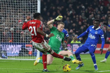 Everton 'dan Jordan Pickford 2 Aralık 2023' te Nottingham Forest 'a karşı Everton City Ground, Nottingham' da oynanan Premier League maçı sırasında Anthony Elanga # 21 of Nottingham Forest 'tan şut kurtardı.