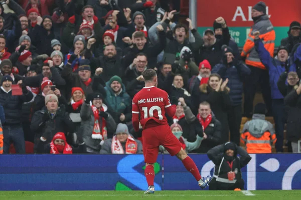 stock image Alexis Mac Allister #10 of Liverpool celebrates his goal to make it 2-1 during the Premier League match Liverpool vs Fulham at Anfield, Liverpool, United Kingdom, 3rd December 2023