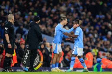 Manchester City 'den Jack Grealish # 10 Premier League maçında Manchester City - Tottenham Hotspur maçında Manchester City' den Jrmy Doku # 11 için 3 Aralık 2023 'te Etihad Stadyumu' nda sahneye çıkıyor.