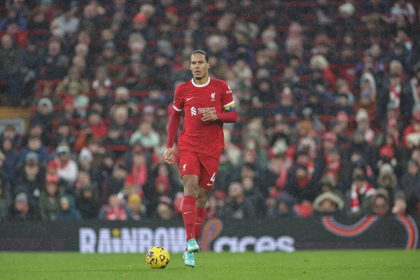 stock image \Virgil van Dijk #4 of Liverpool with the ball during the Premier League match Liverpool vs Fulham at Anfield, Liverpool, United Kingdom, 3rd December 2023