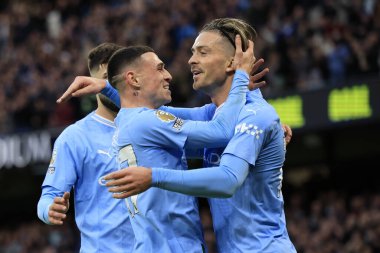 Manchester City 'den Jack Grealish # 10 Premier League maçında Manchester City - Etihad Stadyumu, Manchester, İngiltere' de 16 Aralık 202 tarihli Crystal Palace maçında 1-0 öne geçtikten sonra Manchester City 'den Phil Foden # 47 ile kutlama yapıyor.