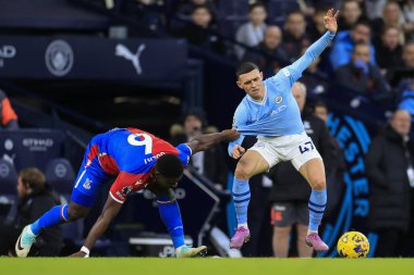 Manchester City 'den Phil Foden # 47 Premier League maçında Marc Guehi # 6 Kristal Saray' a karşı Manchester City - Manchester Stadyumu, İngiltere, 16 Aralık 202
