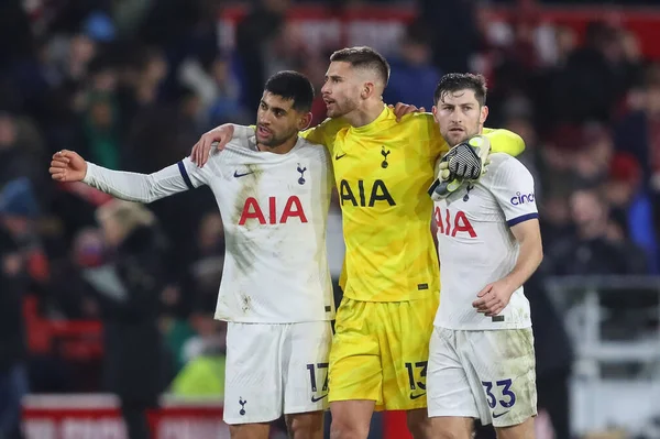 stock image Cristian Romero #17 of Tottenham Hotspur, Guglielmo Vicario #13 of Tottenham Hotspur and Ben Davies #33 of Tottenham Hotspur celebrate the 0-2 win during the Premier League match Nottingham Forest vs Tottenham Hotspur at City Ground, Nottingham, Unit