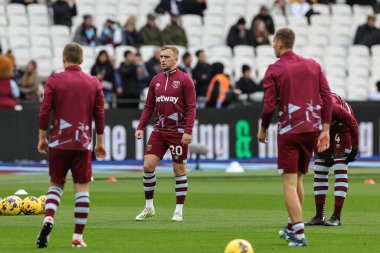 West Ham United takımından Jarrod Bowen, Premier League maçında maç öncesi ısınma oturumunda West Ham United ile Manchester United 'ı Londra Stadyumu' nda, 23 Aralık 202 'de yendi.