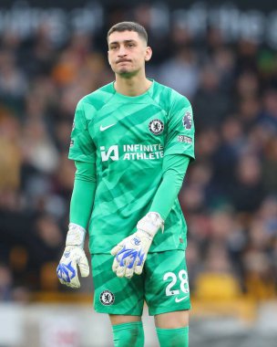 Chelsea 'den Corce Petrovi, 24 Aralık 2023' te İngiltere 'nin Wolverhampton kentinde oynanan Premier League karşılaşmasında Wolverhampton Wanderers Chelsea' ye karşı oynadığı maçta hayal kırıklıklarını gösteriyor.