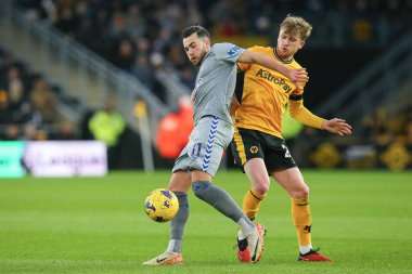 Everton 'dan Jack Harrison # 11 Premier League maçında Wolverhampton Wanderers, Everton' a karşı Molineux, Wolverhampton, Birleşik Krallık 'ta 30 Aralık 202' de oynanan maçta Wolverhampton Wanderers 'ın 20 numarası Tommy Doyle' a faul yaptı.