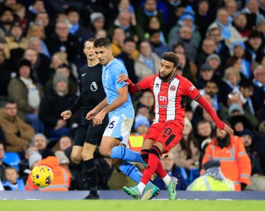 Manchester City 'den Rodri ve Sheffield United takımından Cameron Archer, Premier League maçında Manchester City ile Sheffield United' ın Etihad Stadyumu 'nda 30 Aralık 202' de karşı karşıya geldiler.