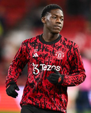 Manchester United takımından Kobbie Mainoo 30 Aralık 202 'de İngiltere' nin Nottingham City Ground kentinde oynanan Premier League maçı öncesi ısınma maçında Nottingham Forest ile Manchester United karşılaşacak.