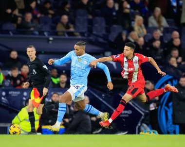Manchester City 'den Manuel Akanji Sheffield United' dan William Osula 'nın 30 Aralık 202' de Etihad Stadyumu 'nda Manchester City ile Sheffield United arasındaki Premier League maçı sırasında kovaladığı takibi sürdürüyor.