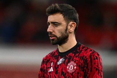 Manchester United takımından Bruno Fernandes 30 Aralık 202 'de İngiltere' nin Nottingham City Ground kentinde oynanan Premier League maçında Manchester United 'a karşı oynadığı maç öncesi ısınma maçında