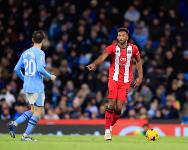 Sheffield United takımından Auston Trusty 30 Aralık 202 tarihinde Etihad Stadyumu 'nda Manchester City ile Sheffield United arasında oynanan Premier League maçında
