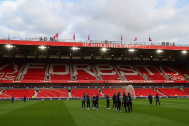 Blackpool oyuncuları sahaya, Birleşik Krallık 'ın Nottingham Forest-Blackpool maçının 3. turu öncesinde, 7 Ocak 202' de Nottingham Forest-Blackpool maçında bakmaktadırlar.