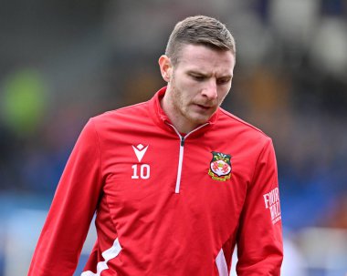 Wrexham 'dan Paul Mullin, 7 Ocak 202' de Croud Meadow, Shrewsbury, Birleşik Krallık 'ta oynanan Emirates FA Cup üçüncü tur karşılaşmasında ısınıyor.