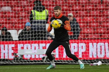 Blackpool 'dan Daniel Grimshaw, 7 Ocak 202 tarihinde Birleşik Krallık' ın Nottingham şehrinde oynanan Emirates FA Cup üçüncü tur karşılaşmasında ısınma turunda Nottingham Forest 'a karşı Blackpool' da