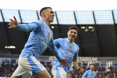 Manchester City 'den Phil Foden, 7 Ocak 202 tarihinde Etihad Stadyumu' nda oynanan ve Manchester City 'nin Huddersfield Town' a karşı oynadığı FA Cup üçüncü tur maçında 1-0 'lık skoru kutluyor.