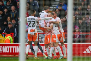 Blackpool 'dan Albie Morgan, 7 Ocak 202' de İngiltere 'nin Nottingham kentinde oynanan Emirates FA Cup üçüncü tur karşılaşmasında golünü 2-0 atmasını kutluyor.