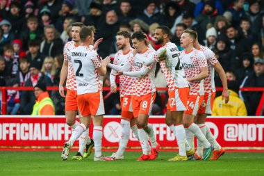 Blackpool 'dan Albie Morgan, 7 Ocak 202' de İngiltere 'nin Nottingham kentinde oynanan Emirates FA Cup üçüncü tur karşılaşmasında golünü 2-0 atmasını kutluyor.