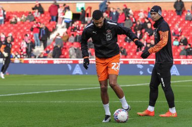 Blackpool 'dan CJ Hamilton, Birleşik Krallık' ın Nottingham şehrinde oynanan Üçüncü tur Nottingham Forest - Blackpool maçı sırasında oynanan maç öncesi ısınma maçında