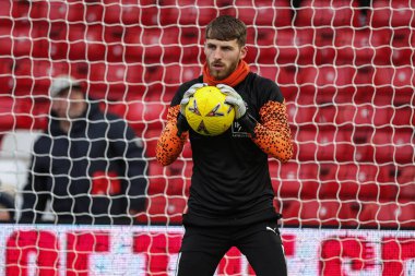 Blackpool 'dan Daniel Grimshaw, 7 Ocak 202 tarihinde Birleşik Krallık' ın Nottingham şehrinde oynanan Emirates FA Cup üçüncü tur karşılaşmasında ısınma turunda Nottingham Forest 'a karşı Blackpool' da
