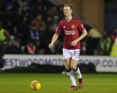 Manchester United takımından Jonny Evans, 8 Ocak 202 'de Wigan Atletizm ve Manchester United' a karşı oynanan üçüncü tur karşılaşmasında, Birleşik Krallık 'ın başkenti Wigan' da mücadele etti.