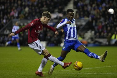 Manchester United takımından Alejandro Garnacho, 8 Ocak 2024 tarihinde İngiltere 'nin Wigan kentinde oynanan Wigan Atletizm Şampiyonası' nda oynanan üçüncü tur karşılaşmasında topu geçti.