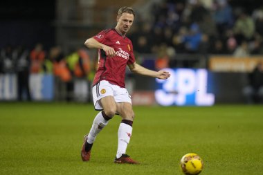 Manchester United takımından Jonny Evans, 8 Ocak 2024 'te Wigan Atletizm ve Manchester United' a karşı oynanan üçüncü tur karşılaşmasında, Birleşik Krallık 'ın başkenti Wigan' da mücadele etti.