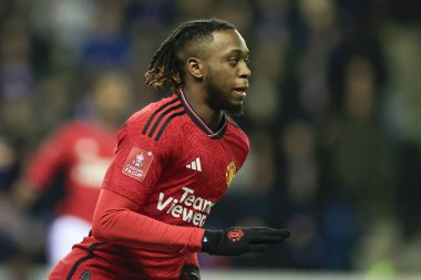 Manchester United takımından Aaron Wan Bissaka, Birleşik Krallık 'ın Wigan Stadyumu' nda oynanan Wigan Atletizm Karşılaşması 'nda 8 Ocak 2024 tarihinde oynanan 3.