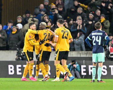 Wolverhampton Wanderers 'dan Nelson Semedo, 16 Ocak 2024 tarihinde Wolineux, Wolverhampton, Birleşik Krallık' ta oynanan üçüncü tur rövanş karşılaşmasında 1-1 kazanma hedefini kutluyor. 