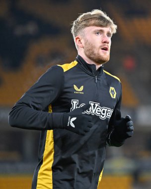 Wolverhampton Wanderers takımından Tommy Doyle, 16 Ocak 2024 tarihinde İngiltere 'nin başkenti Wolverhampton' da oynanan üçüncü tur rövanş karşılaşmasında ısınıyor. 