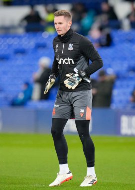 Kristal Saray 'dan Dean Henderson, 17 Ocak 202' de İngiltere 'nin Liverpool kenti Goodison Park' ta oynanan üçüncü tur müsabakası sırasında oynanan Emirates FA Cup rövanşı öncesinde ısınıyor.