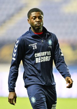 Wycombe Wanderers takımından Gideon Kodua, Wigan Atletizm Şampiyonası 'na karşı 23 Ocak 202' de oynanan Wigan Atletizm Ligi 1 karşılaşmasında maç öncesinde ısınıyor.