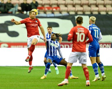 Wycombe Wanderers takımından Sam Vokes, 23 Ocak 202 'de Wigan Atletizm ve Wycombe Wanderers maçında Wigan Stadyumu' nda bir maç kazandı.