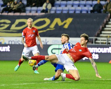 Wigan Athletic takımından Joe Low, Wigan Atletizm Ligi 1 karşılaşmasında Wigan Atletizm Ligi 'nin Wycombe Wanderers' a karşı oynadığı Wigan Stadyumu 'nda 23 Ocak 202' de Wigan Atletizm Ligi 'nden Charlie Wyke' yi yendi.