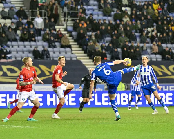 Wigan Atletizm takımından Charlie Hughes, Wigan Atletizm Ligi 1 maçında Wigan Atletizmi 'ne karşı Wigan Stadyumu, Wigan, Birleşik Krallık' ta 23 Ocak 202 'de oynanan maçta son golü attı.