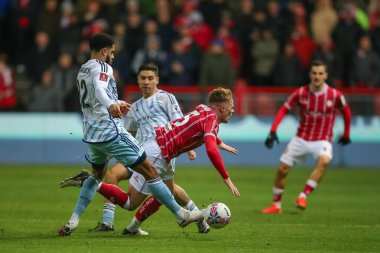Nottingham Ormanı 'ndan Andrew Omobamidele, Bristol, Bristol' da Bristol City 'nin Nottingham Ormanı' na karşı oynadığı dördüncü tur müsabakasında Bristol şehrinden Tommy Conway 'e faul yaptı.