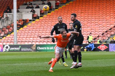 Blackpool 'dan Jordan Rhodes ve Charlton Atletizm Ligi' nden Macaulay Gillesphey 27 Ocak 202 'de Bloomfield Road, Blackpool' da oynanan Blackpool - Charlton Atletizm maçında top mücadelesi verdiler.
