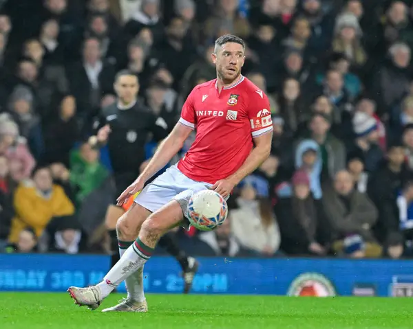 Wrexham 'dan Ben Tozer, Birleşik Krallık' ın Blackburn kentinde oynanan dördüncü tur karşılaşmasında Blackburn Rovers, Wrexham 'a karşı.
