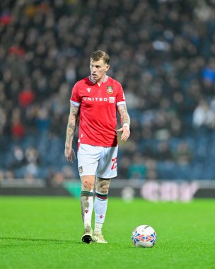 Wrexham 'dan James McClean, Birleşik Krallık' ın Blackburn kentinde oynanan dördüncü tur Blackburn Rovers - Wrexham karşılaşmasında topa doğru yürüyor.