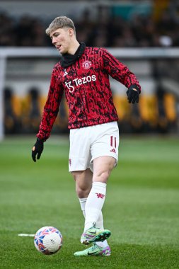 Manchester United takımından Rasmus Hjlund, 28 Ocak 2024 'te Birleşik Krallık' ın Newport kentinde oynanan dördüncü tur müsabakasında, Emirates FA Cup 'ın dördüncü turu öncesinde oynanan ısınma maçında