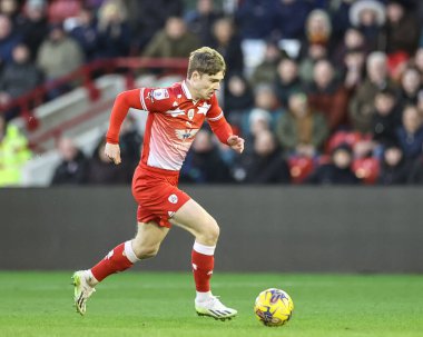 Barnsley 'den Luca Connell, 27 Ocak 202' de İngiltere 'nin Oakwell kentinde oynanan Sky Bet 1 karşılaşmasında topu aldı.